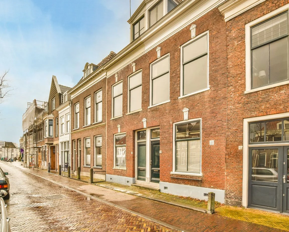 Row of small business frontages on a quiet street