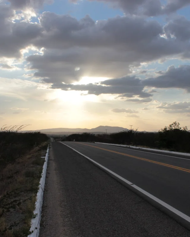 Empty highway running to the horizon under a wide sky