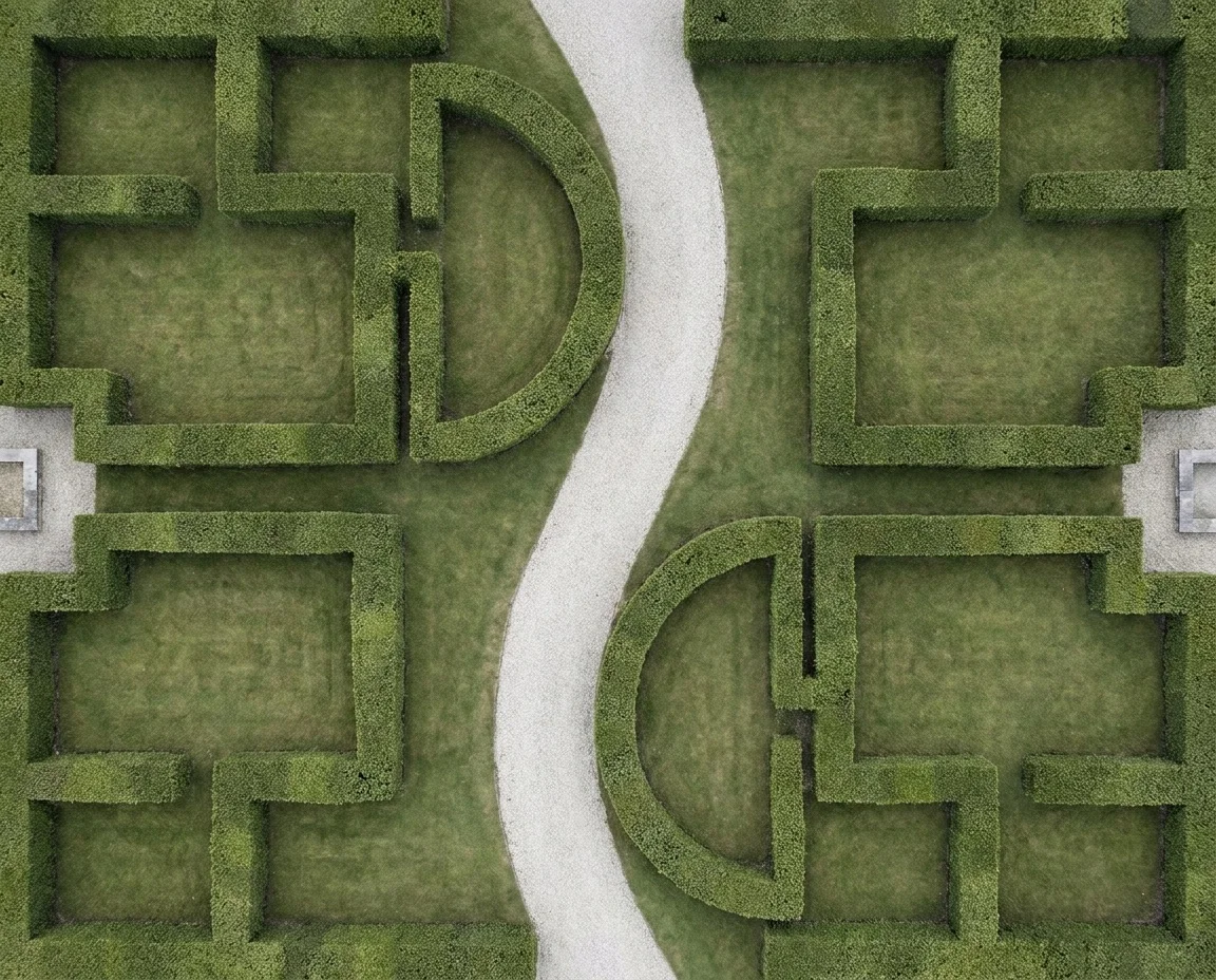 Aerial view of a manicured commercial landscape with clipped hedge lines