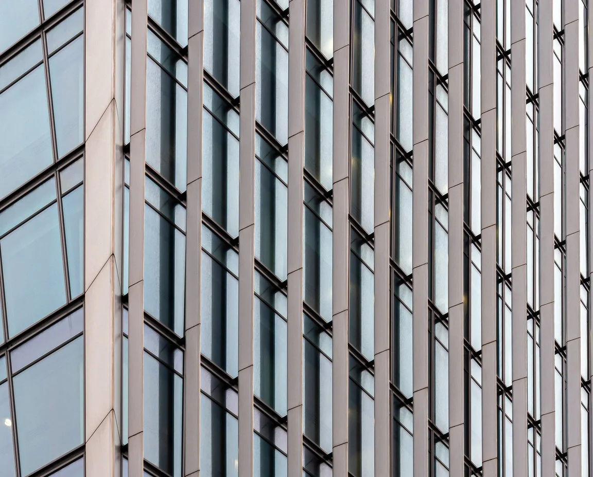 Professional office frontage in daylight with plain glazing