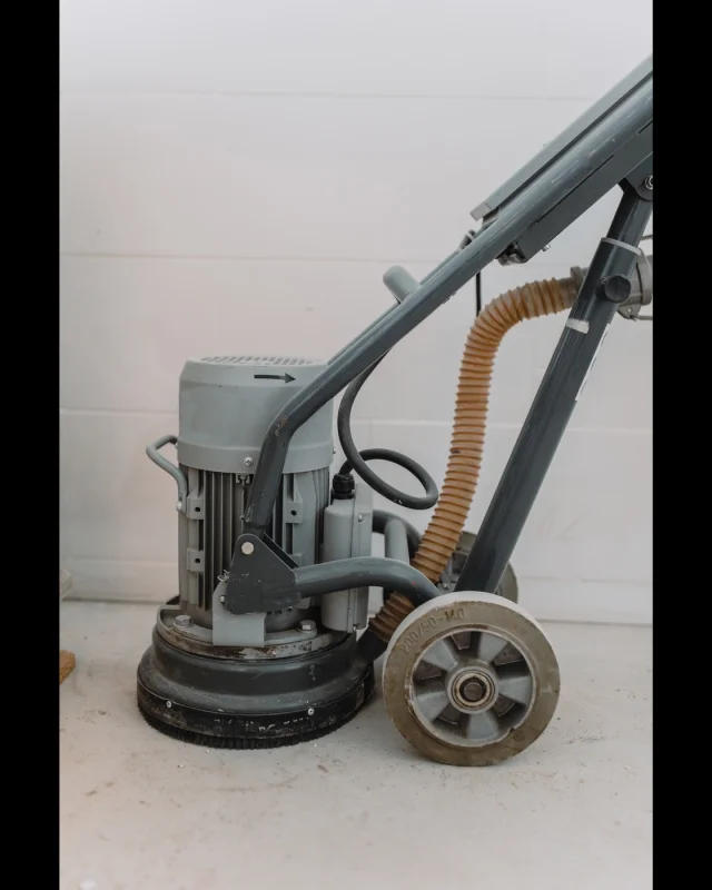 Industrial extraction and drying equipment on a hard floor